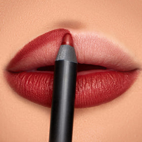 K7L Flame lip crayon swatch shows bold red-brown color with rich payoff.