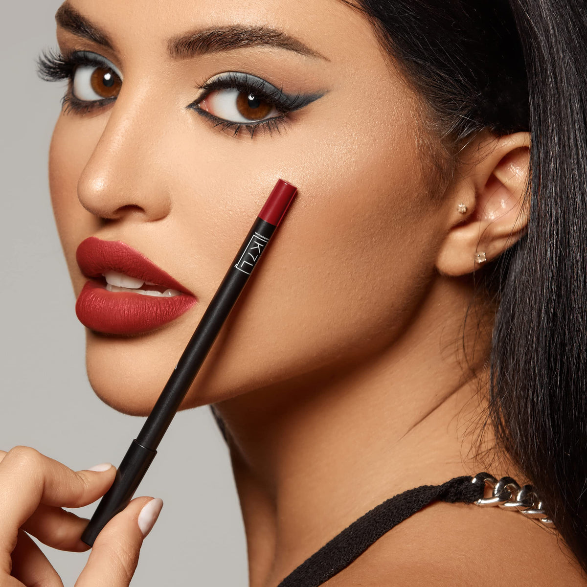 K7L Flame lip crayon closeup highlights rich matte texture.