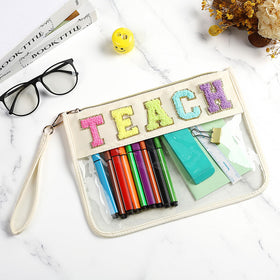 Kacctyen bag with wristband handle for convenient on-the-go use.