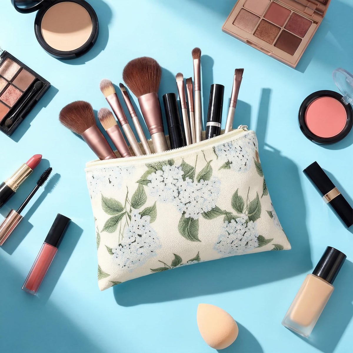 Kacctyen blue floral bow cosmetic bag, perfect for keeping brushes and essentials.