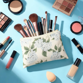 Kacctyen blue floral bow cosmetic bag, perfect for keeping brushes and essentials.