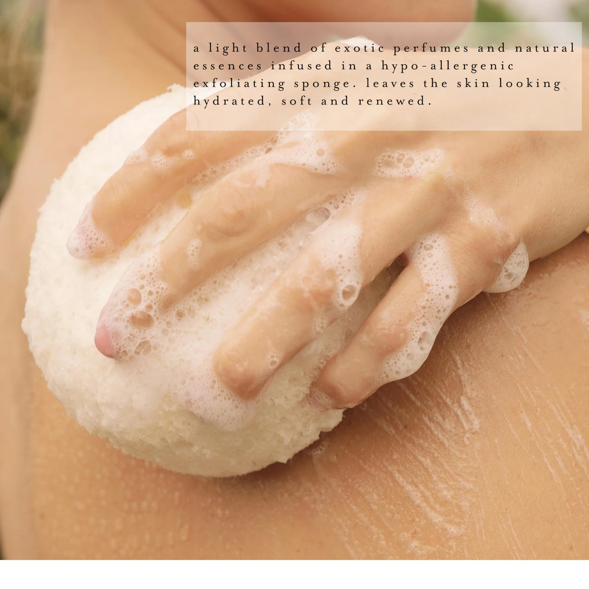 Kai Body Buffer gardenia scent imagery in bath showing fresh floral fragrance.