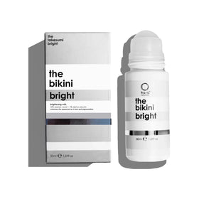 Kaia Naturals Takesumi Bright bikini brightening milk bottle showing fragrance-free, alcohol-free formula for sensitive bikini areas.