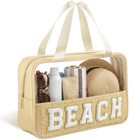 Kajaia clear beach bag with beige chenille patch for quick cosmetic access.