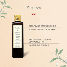 Bringadi Tailam drops on scalp by Kama Ayurveda for nourishing care.