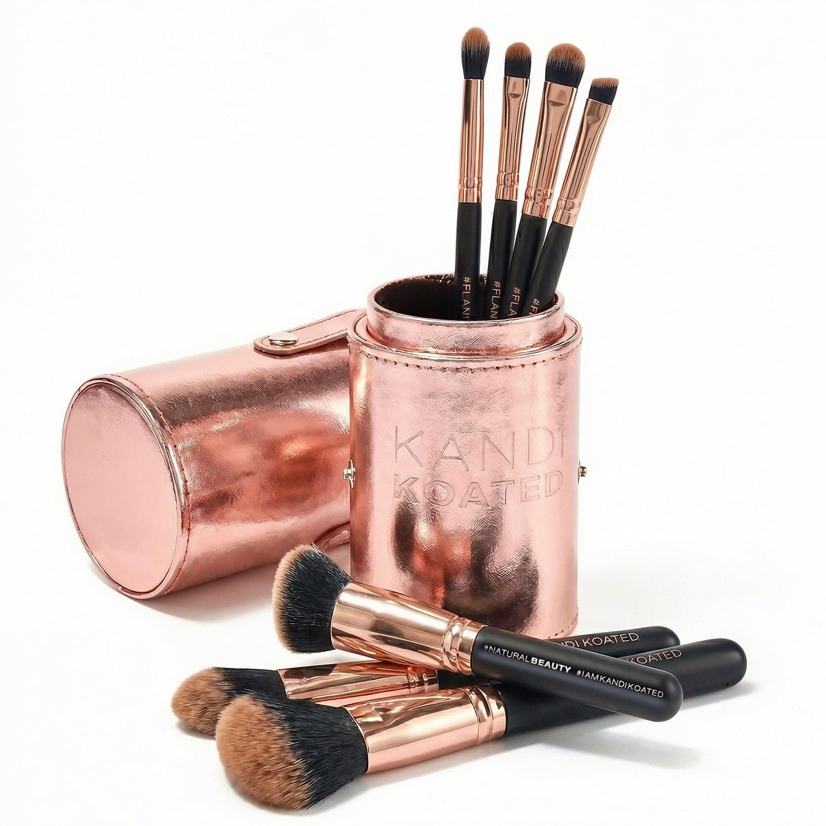 Kandi Koated cosmetics makeup brush set in rose-gold case for travel-ready application.