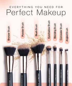 Kandi Koated rose-gold embossed travel case doubles as a brush stand.