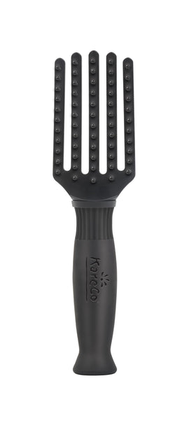 KareCo Tangle Buster mini teal in hair for gentle detangling