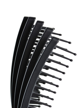 KareCo Tangle Buster mini travel black front view compact travel essential
