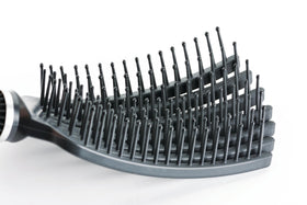 KareCo Tangle Buster mini travel black in bag ready for grooming anywhere