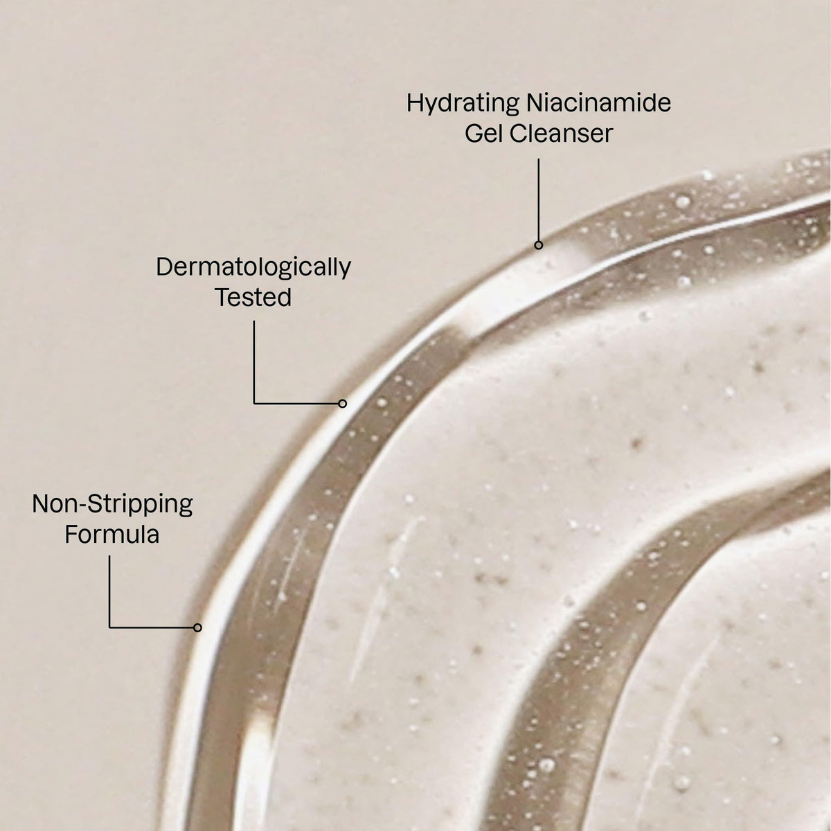 Karuna cleanser pump close-up showing easy application and subtle foam