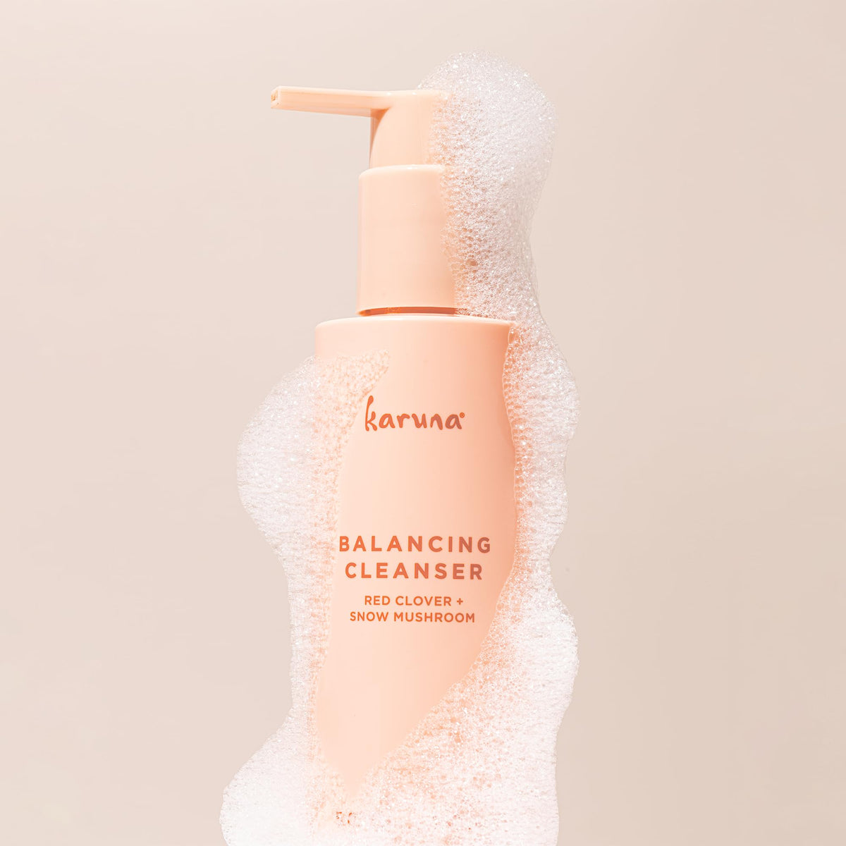 Karuna Gel Cleanser texture shown with gentle, non-stripping action