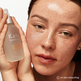 Kate Somerville Liquid ExfoliKate bottle on a clean bathroom shelf
