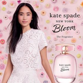 Spray application shows a light, even mist for Kate Spade Bloom.