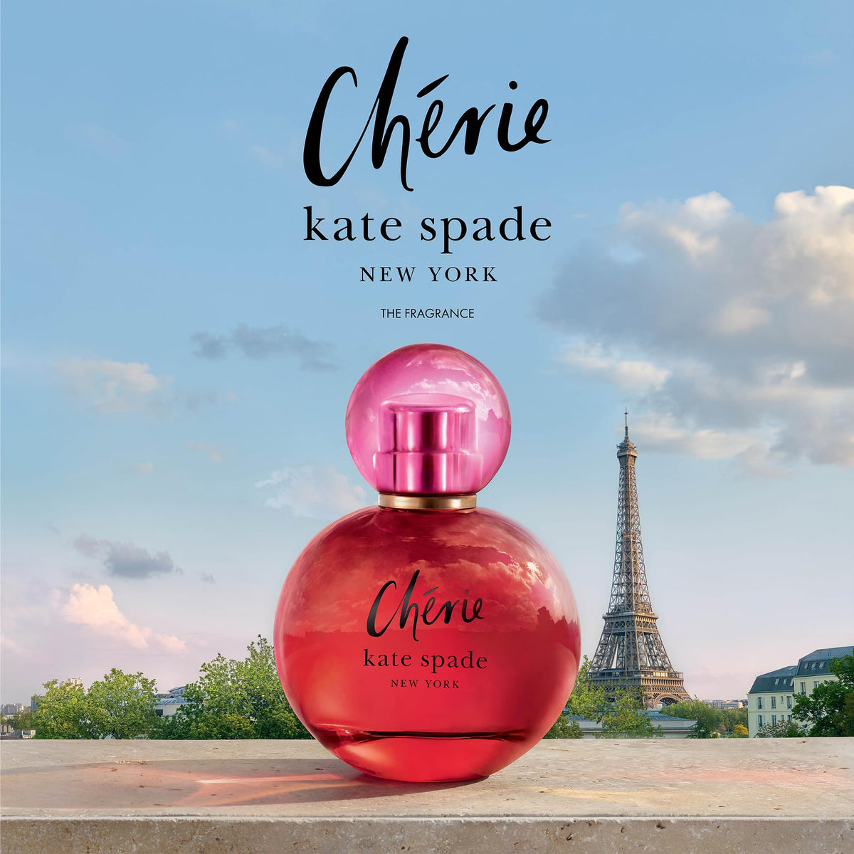 Kate Spade Cherie spray application in hand, showcasing effortless refresh.