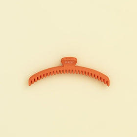 KAXI Claw complements outfits while keeping hair secure.
