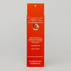 Kaxi scalp care exfoliation close-up shows gentle bristles.