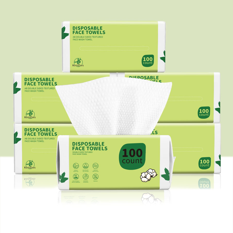 KeeiZoes disposable face towels stacked, ultra-soft for gentle cleansing.