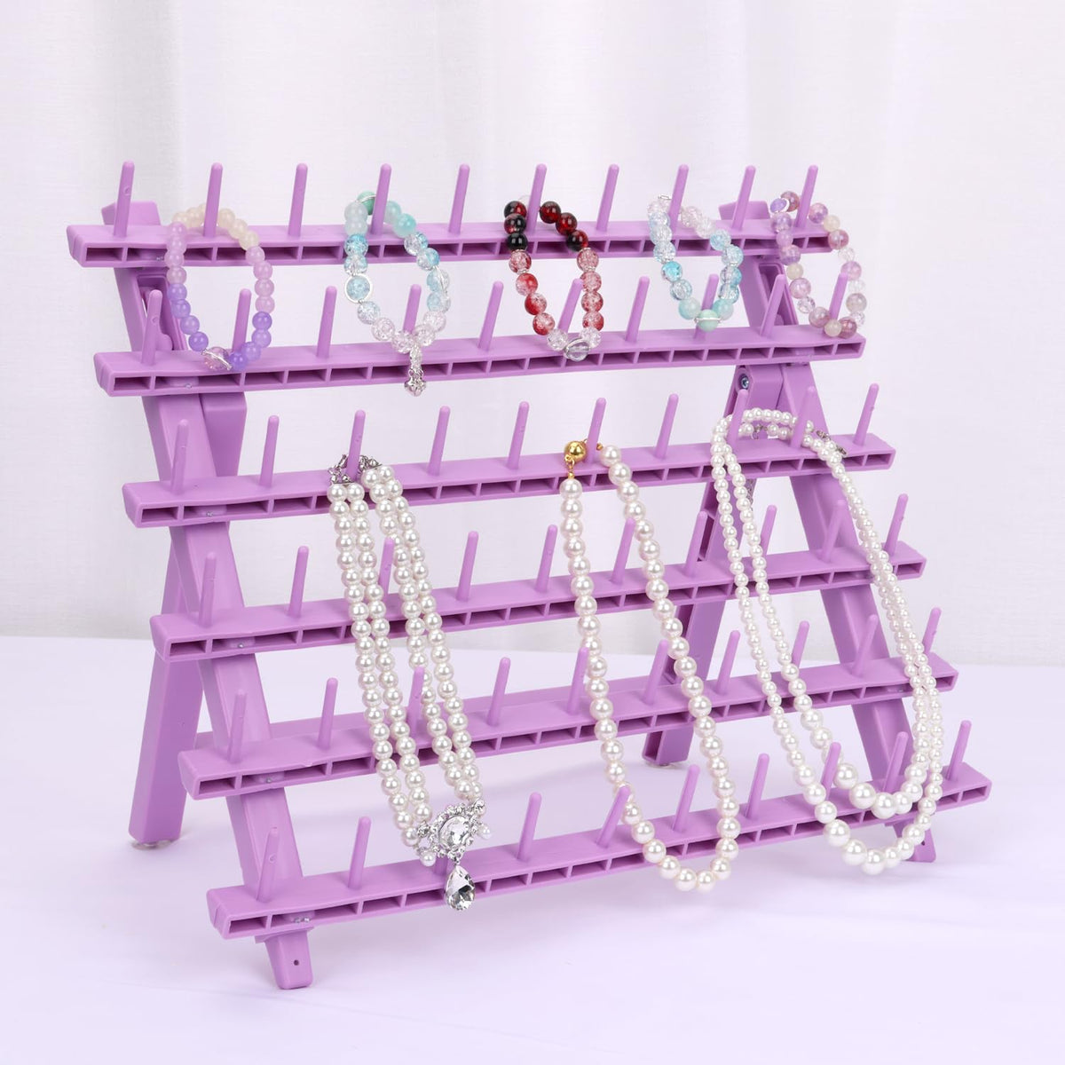 Kelukeya Braid Rack in studio setup for professional braiding work