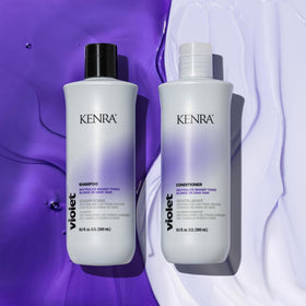 Shampoo and conditioner on a vanity with blonde hair model.