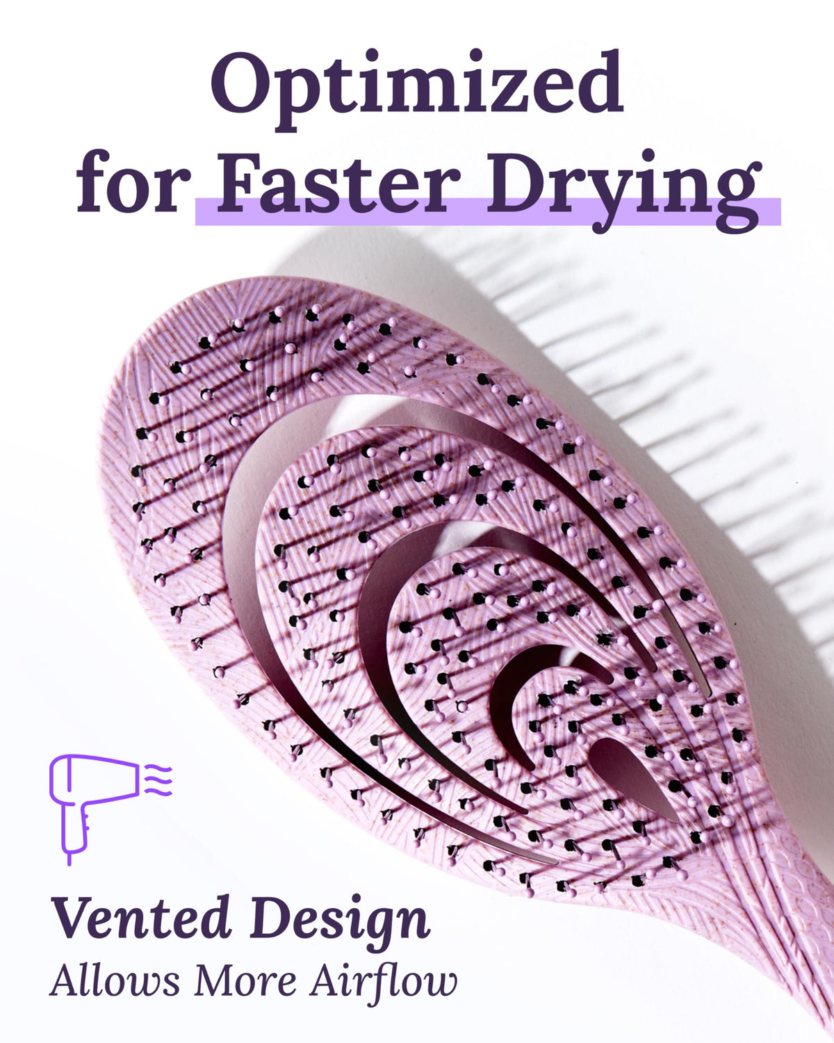 Keranique flexible paddle design adapts to head contours for comfortable detangling.
