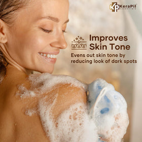 KERAPIL Exfoliating Body Wash arm detail reveals smoother skin texture.