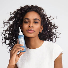 Eco packaging of Kerasilk Hydrating Essence emphasizing sustainability