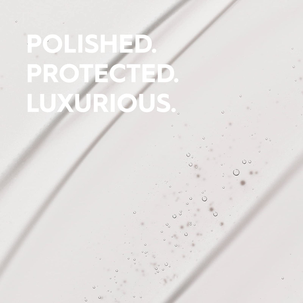 KERASILK Multi-Benefit Hair Oil bottle pour detail for quick nourishment and use.