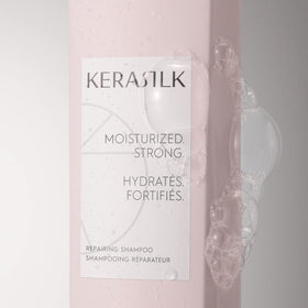 Kerasilk Repairing Shampoo foam close-up, creamy lather cleanses gently.