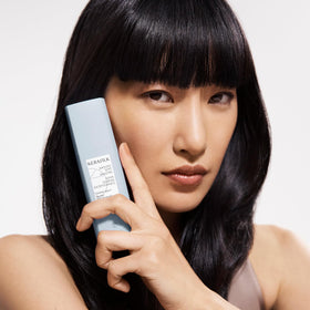 Kerasilk Taming Balm hair frizz-control scene suggests lasting manageability