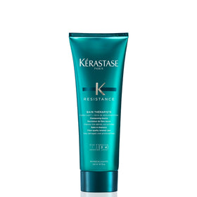 Kérastase Bain Therapiste bottle front highlighting repair for damaged hair