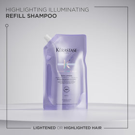 Highlighted hair strands catch light after using Kérastase Blond Absolu Lumière.