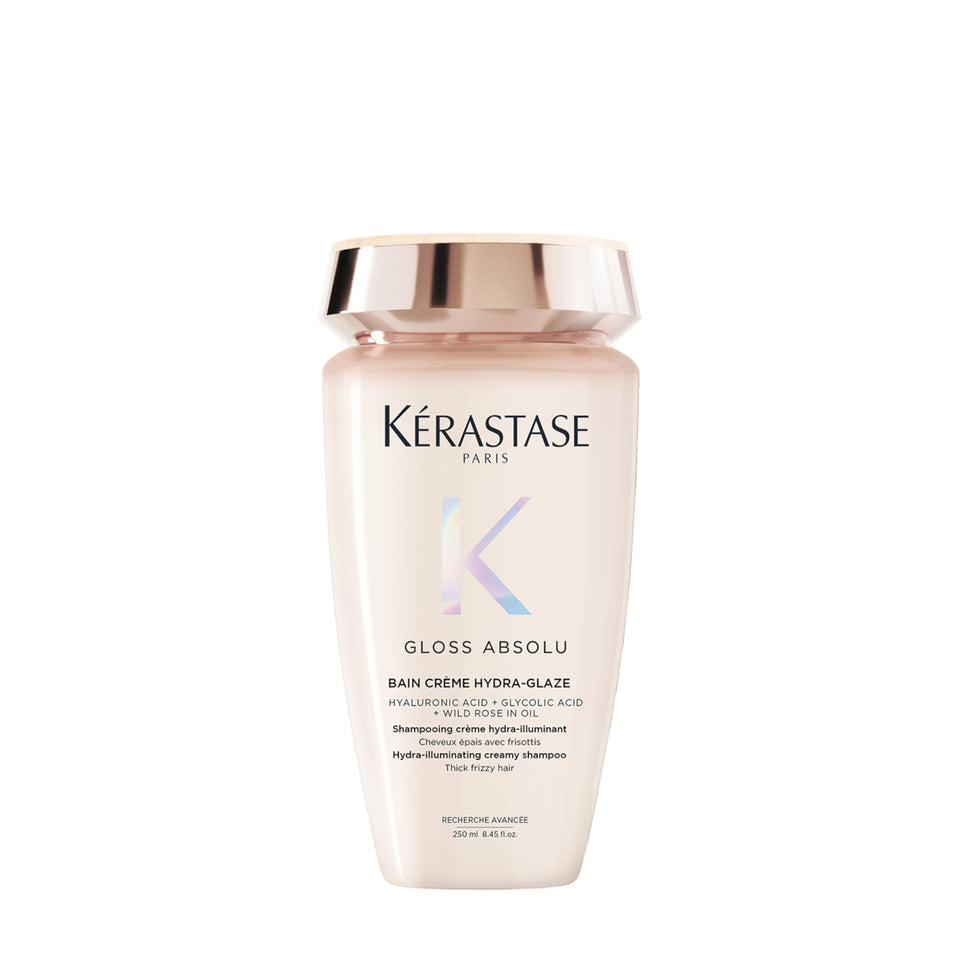 Kérastase Gloss Absolu shampoo bottle highlights a shine-enhancing Hydra-Glaze formula