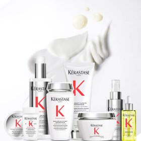 KÉRASTASE Premiere Repair label closeup showcases citric acid benefits.