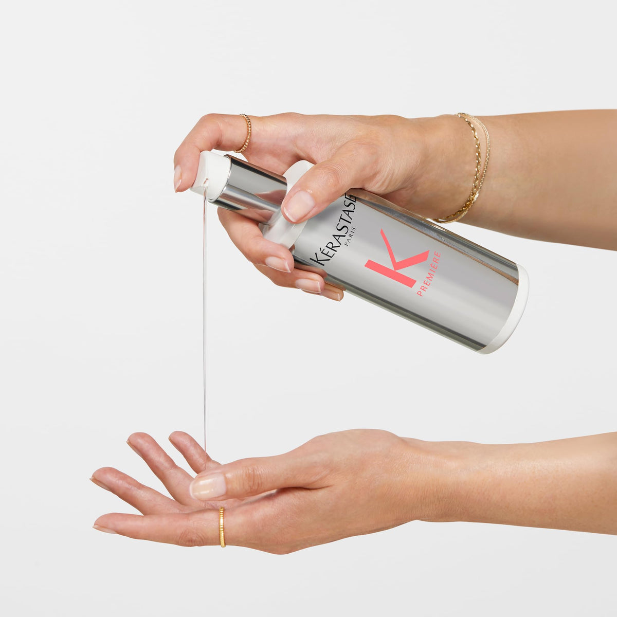 KÉRASTASE Premiere Repair travel-size packaging ready for on-the-go care.