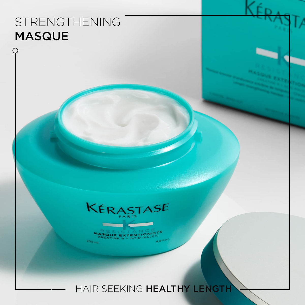 KÉRASTASE Extentioniste creamy texture demonstrates rich conditioning for damaged lengths.
