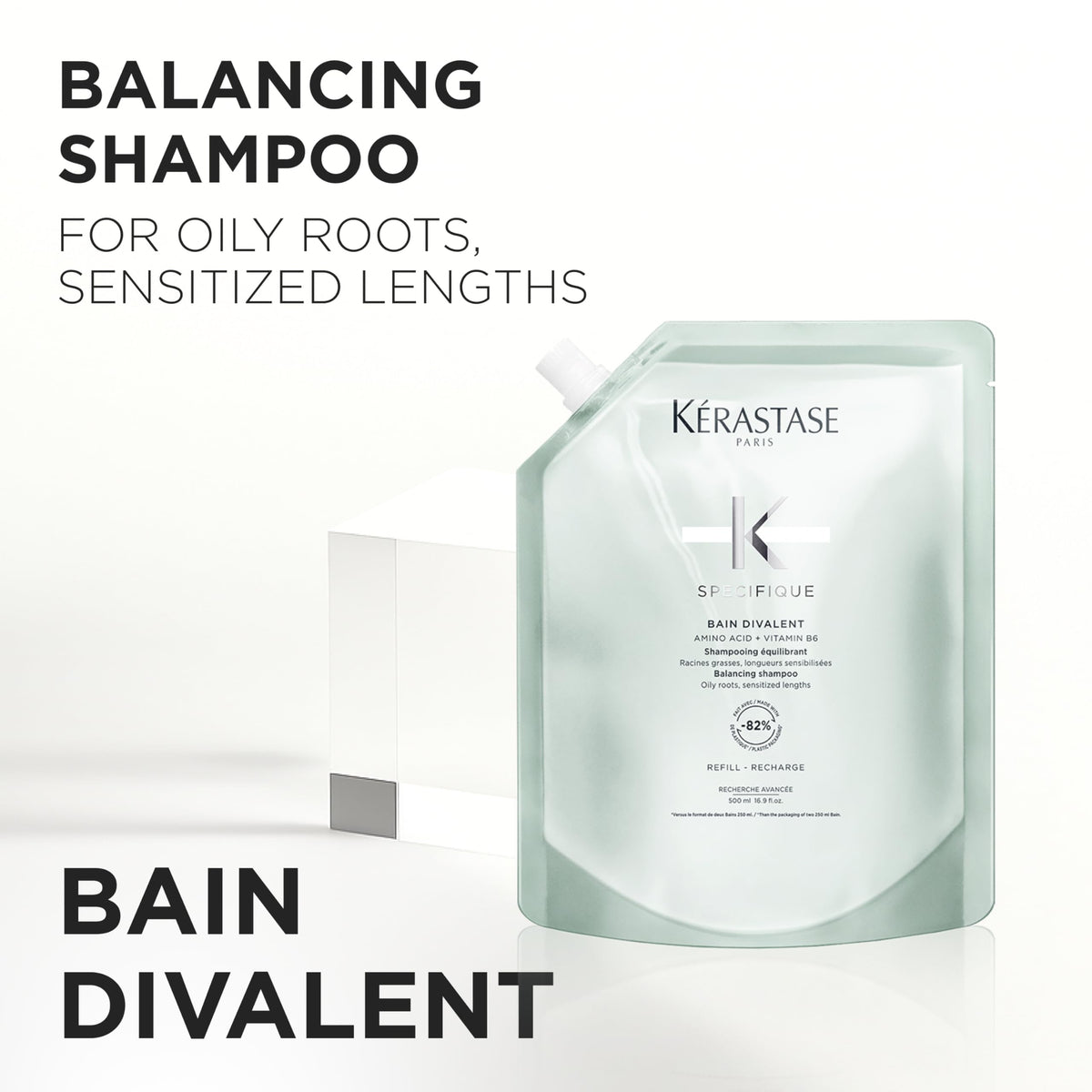 KÉRASTASE Specifique lather around roots for refreshing cleanse.