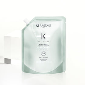 KÉRASTASE Specifique bottle with foam, balanced oil and moisture.