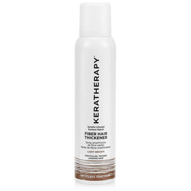 Keratherapy Perfect Match fiber spray on hair shows light brown natural coverage