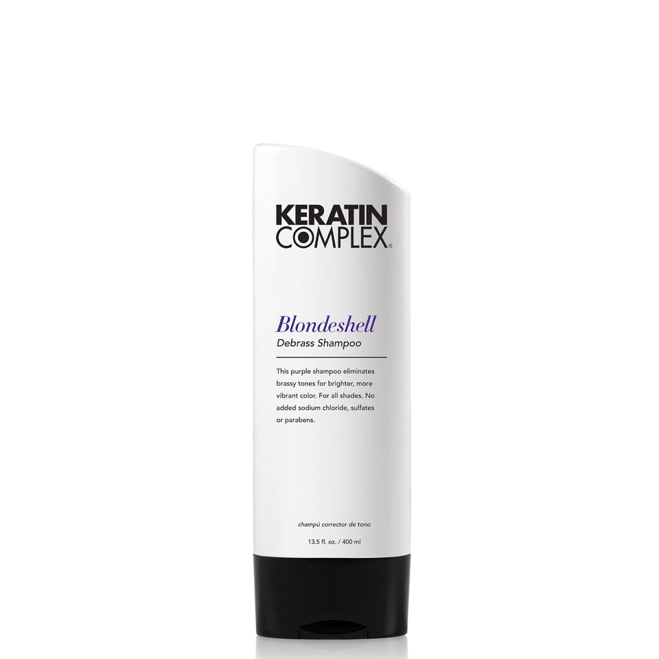 Keratin Complex Blondeshell Debrass Shampoo bottle pour demonstrates convenient use and toning benefits for brass control.