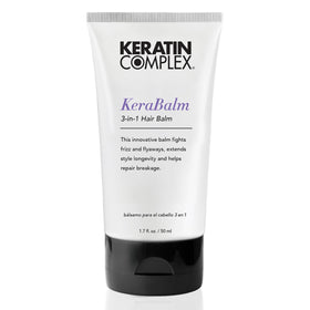 Keratin Complex KeraBalm bottle pour showing frizz control and styling prep.