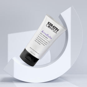 Keratin Complex KeraBalm pump showing easy, precise application.