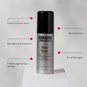 Keratin Complex Shine Spray mist on damp hair for gloss and easier styling.