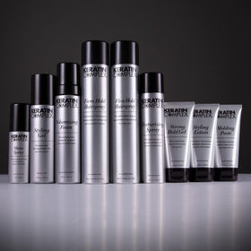 Close-up of Keratin Complex Styling Lotion showing heat and UV protection for hair