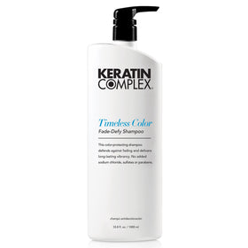 Keratin Complex Timeless Color Fade-Defy shampoo bottle offers color-safe protection for vibrant hair