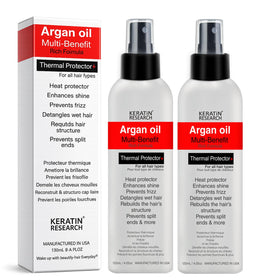 KERATIN RESEARCH Thermal Hair Protector Spray bottle pouring to illustrate heat protection up to 450ºF.