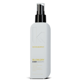 KEVIN.MURPHY BLOW.DRY EVER.SMOOTH bottle on vanity with sleek packaging for smooth styling at home.