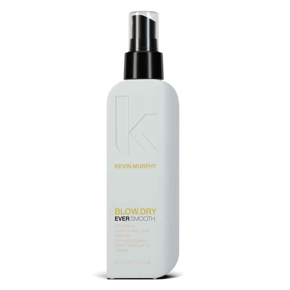 KEVIN.MURPHY BLOW.DRY EVER.SMOOTH bottle on vanity with sleek packaging for smooth styling at home.