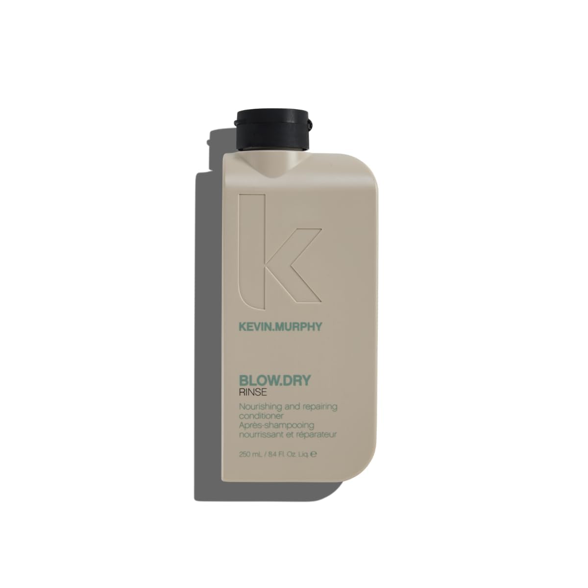 KEVIN.MURPHY BLOW.DRY RINSE bottle with fresh scent and heat protection for styling.