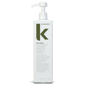KEVIN.MURPHY MAXI.WASH detox bottle pours to cleanse buildup on hair.
